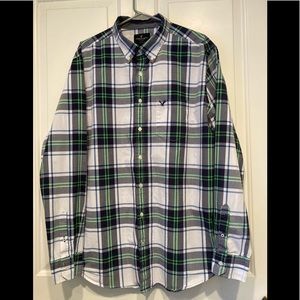 Long sleeve plaid button down shirt.